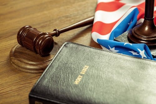 OPINION: Public Officials Should Enforce The Law, Not The Bible