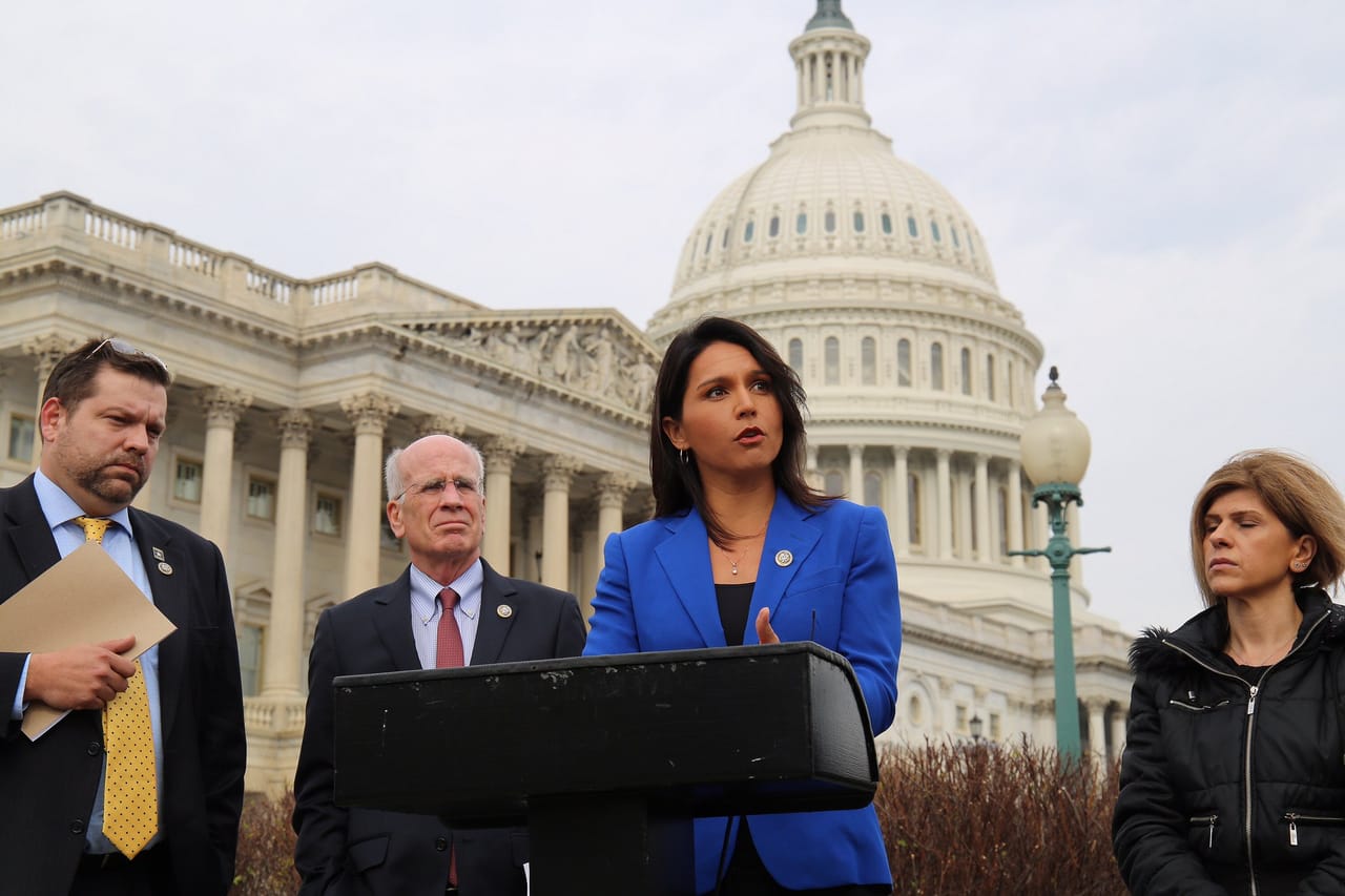Former Clinton S. Delegate Howard Dean Blasts Tulsi for Syria Questions